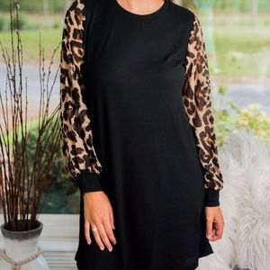 Black dress with leopard sleeves